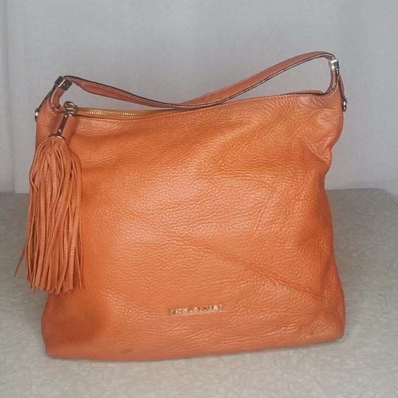 Michael Kors Handbags - MICHAEL KORS Orange Shoulder Bag w Tassel